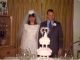 Linda & Don with their wedding cake at Evelyn's house.